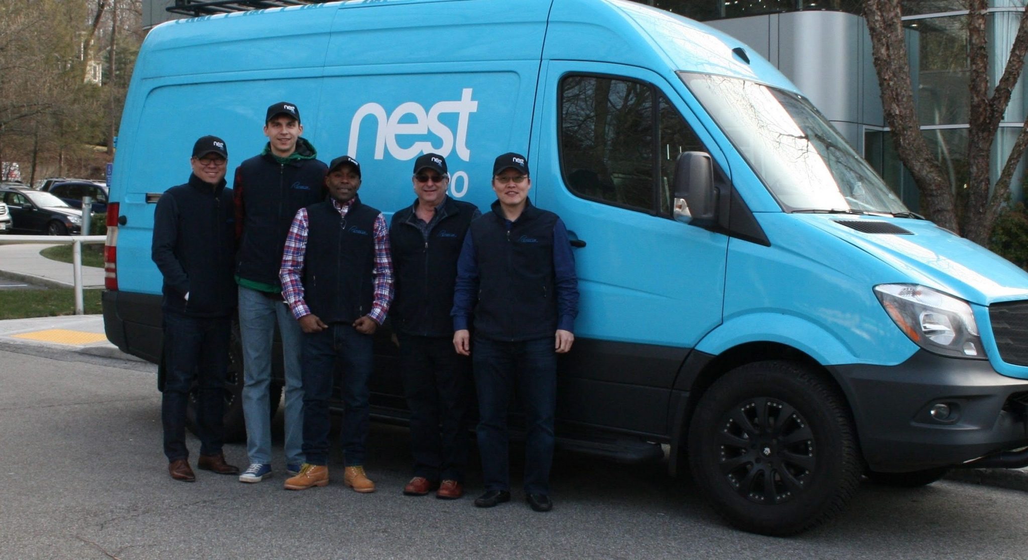 DonHam HVAC contractors team in front of Nest Van